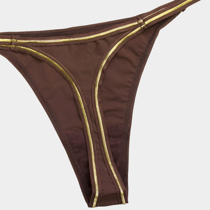 TANGA DETALLES DORADO IP7422